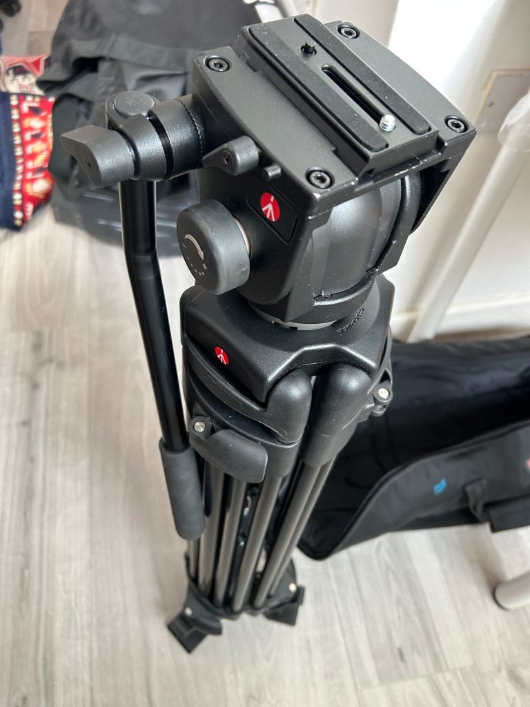 Manfrotto Tripod with Legs, Top Plate, Spreader, Pan Handle, Bag