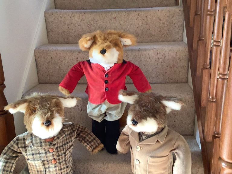 Handmade ornamental family of three foxes.