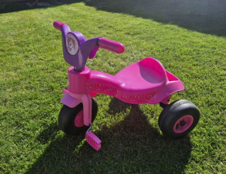 Pink unicorn trike 