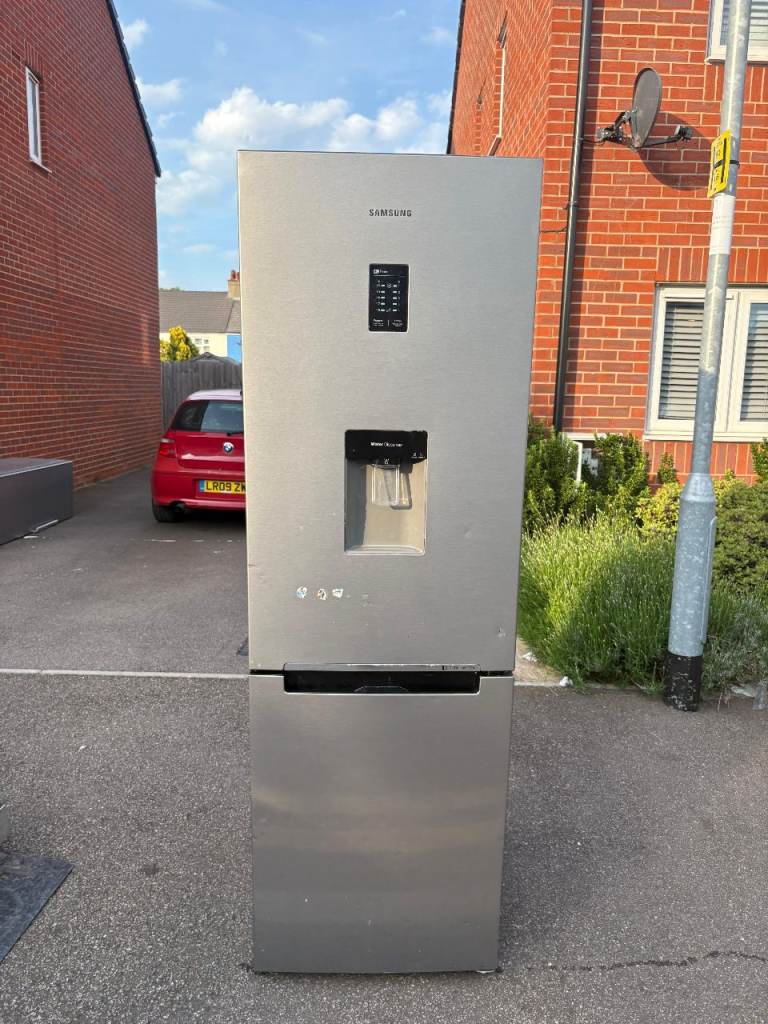 Tall fridge freezer for £140