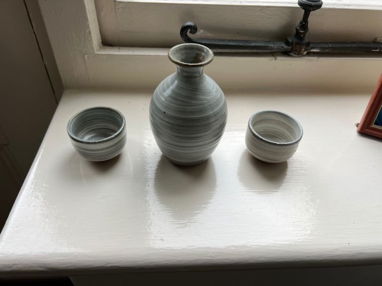 Japanese pottery tea cups and small vase or jug