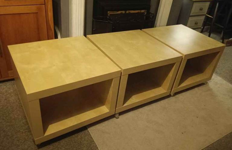 IKEA coffee table cubes on wheels ( three available £10 each )