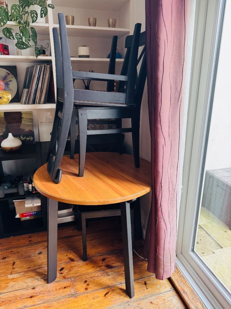 Wooden Round Table + 4 Black Chairs – Compact Dining Set