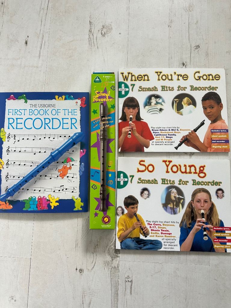 Brand new recorder and 3 music books