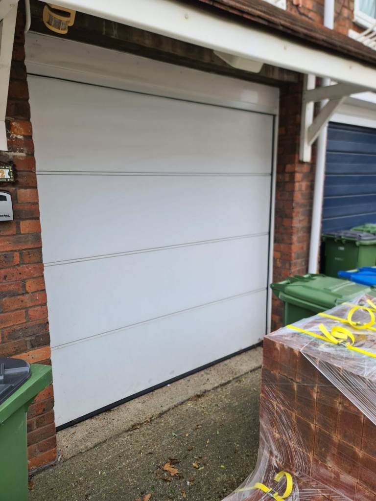 Hormann Sectional Electric Garage Door - with remote opener.