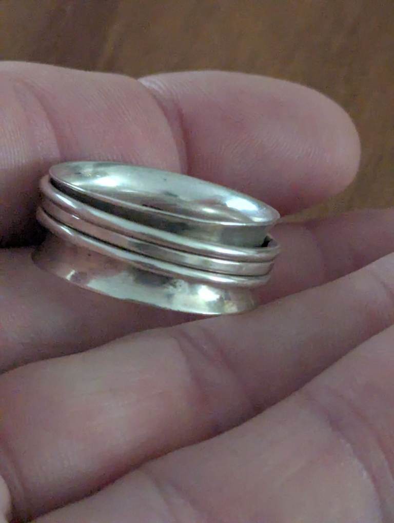 Silver fidget spinner ring