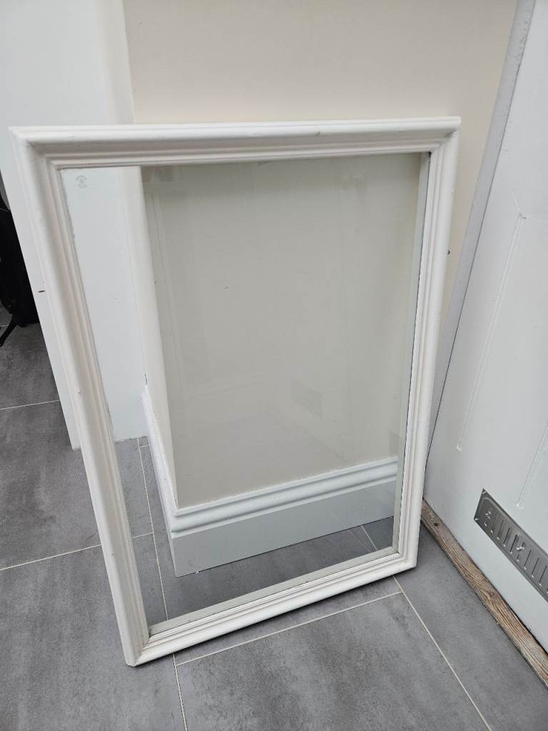 Removable secondary glazing unit 