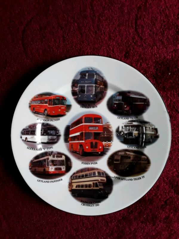 A LARGE PLATE SHOWING 9 BUSES OF YESTERYEAR.