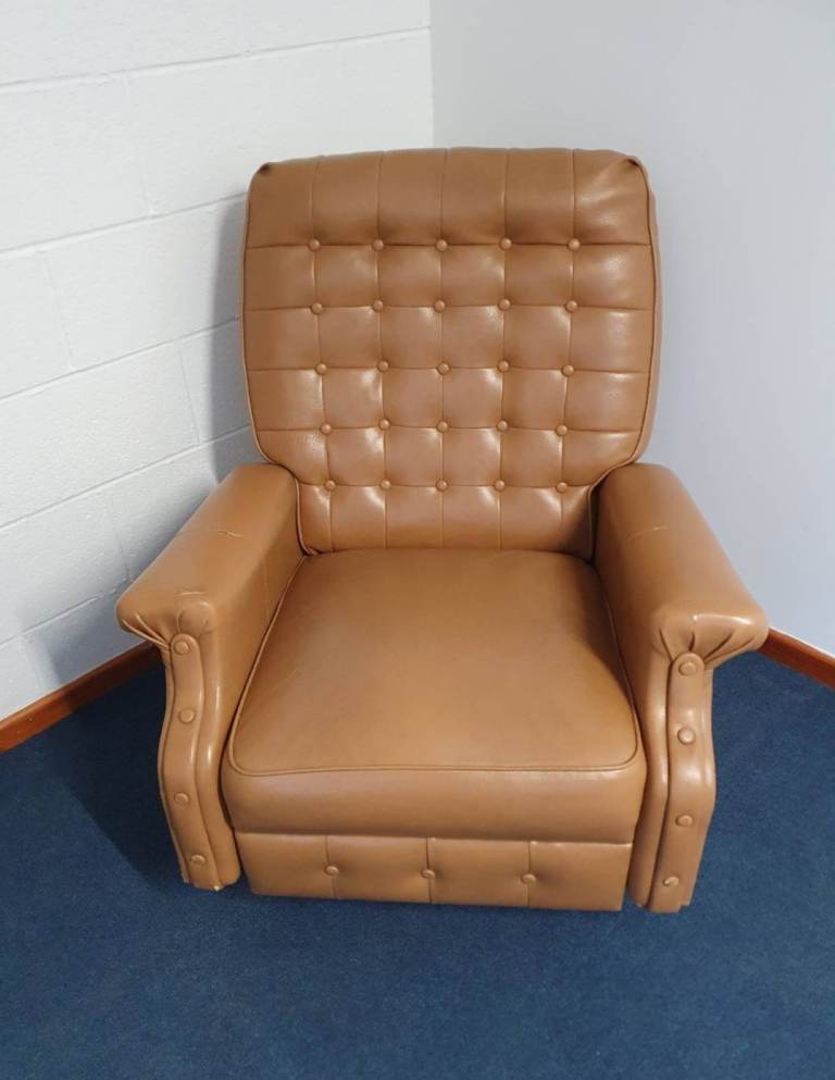 Recliner rocking chair 