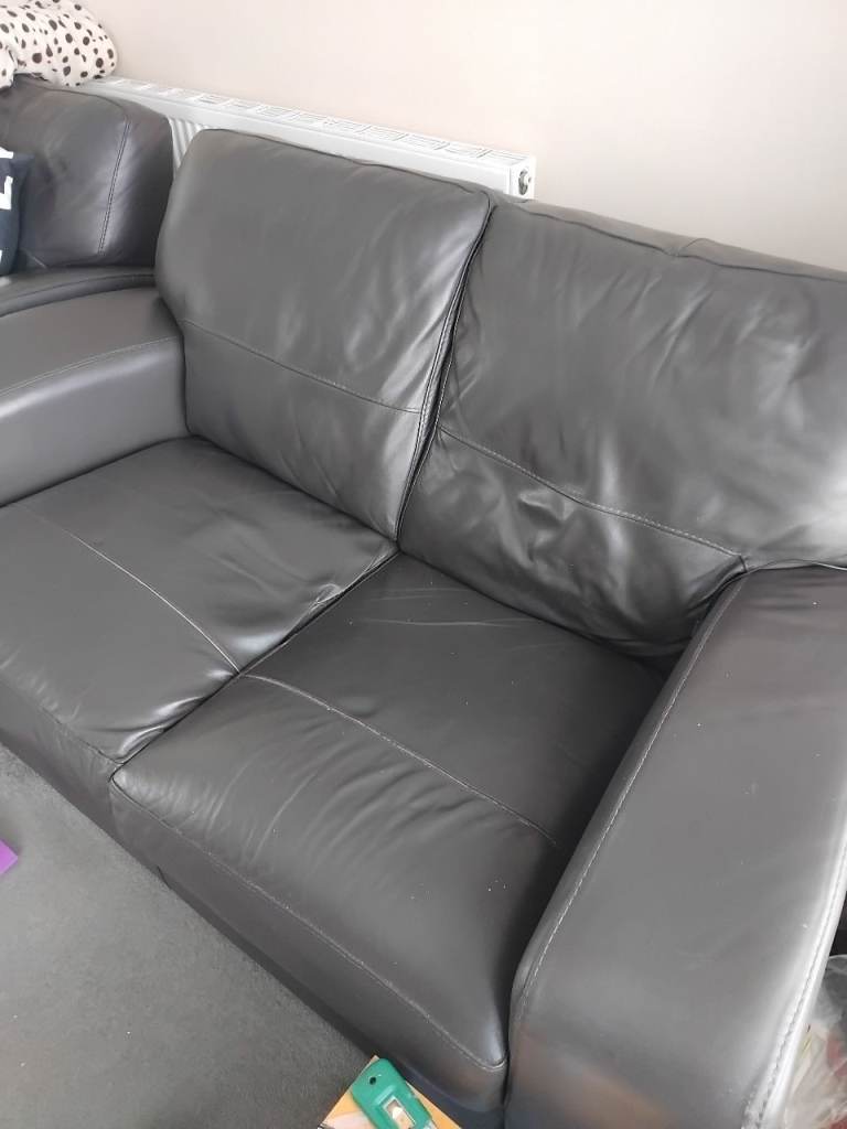 Two seat leather sofa heavy, expensive when new. 