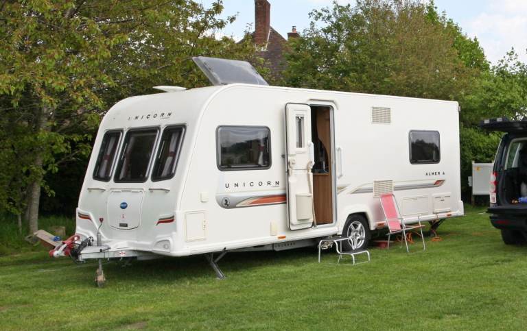 2011 Bailey Unicorn Almeria Caravan – Immaculate 4/5 -Berth Fixed Bed + Full Setup & Motor Mover