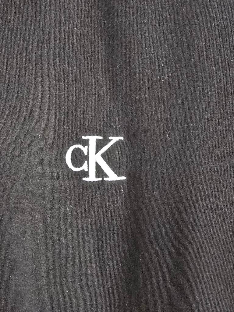 Calvin Klein Jeans Black T-Shirt - Size M, Good Condition
