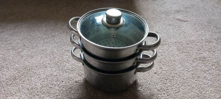 Stainless steel Saucepan and 2 steamer set. £10 