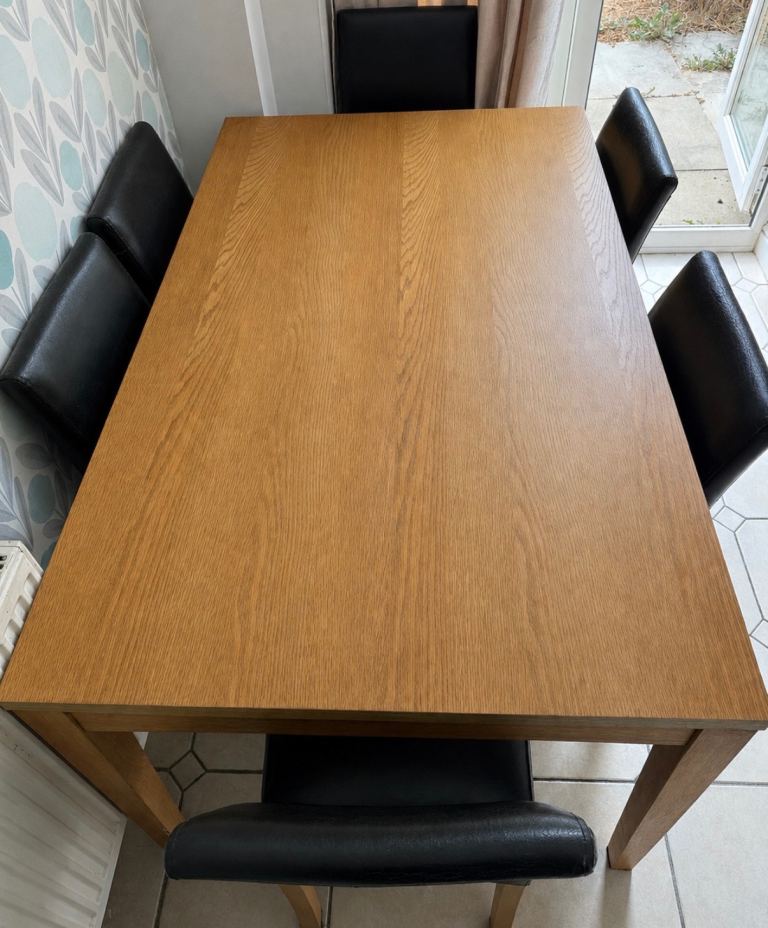 Solid Wood Dining Table with 6 Black Chairs – Good Condition