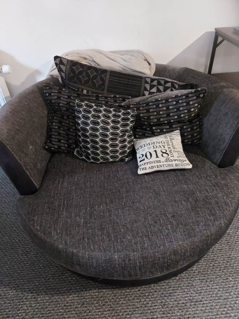 Large DFS Swivel Grey/Black Cuddle Chair