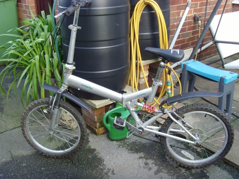 Adults folding city bike