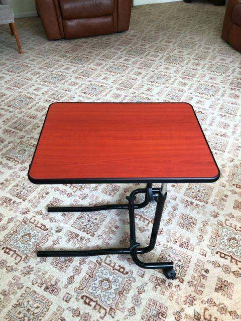 Adjustable overbed table