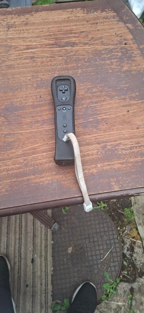 Black Nintendo Wii Remote Controller with Wrist Strap