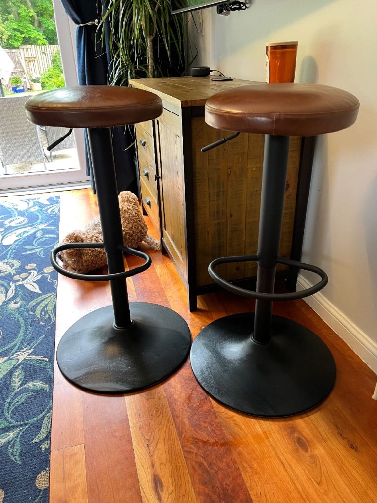 Pair of brown leather bar stools. Like new 
