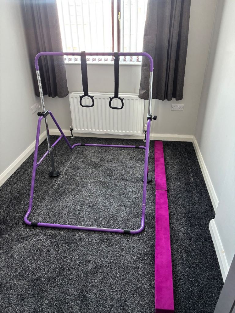 Gymnastic bar (adjustable) with straps and gymnast beem.