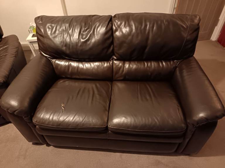 2 brown sofas
