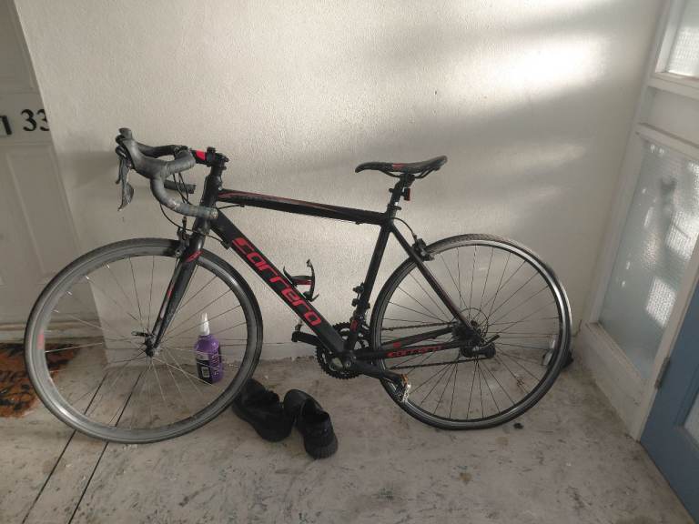 Carrera virtuoso road bike black and red 