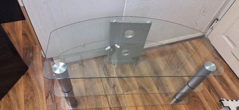 Glass TV Stand with Silver Legs – Good Condition