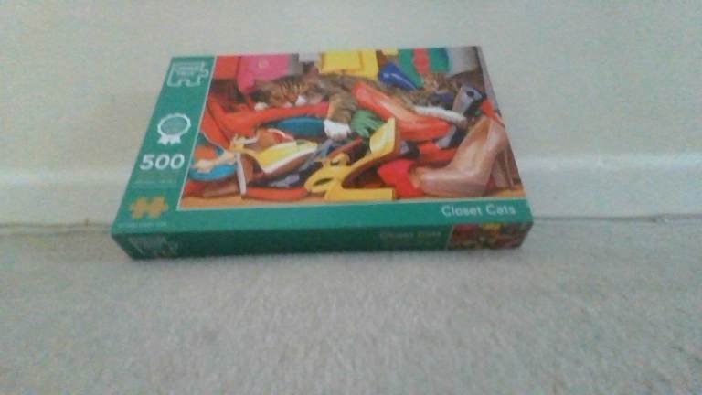 Jigsaw puzzle with cats and shoes