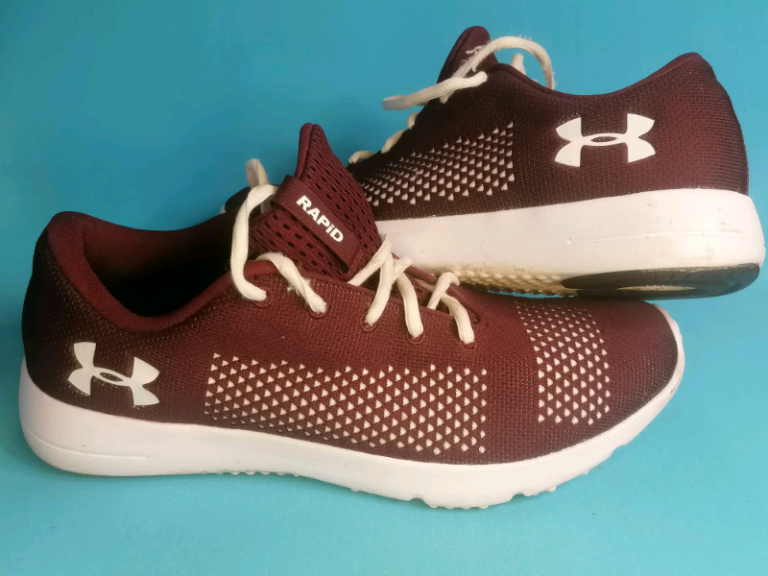Uk size 9.5.Under Armour Trainers White Purple Trim Running Shoes. 