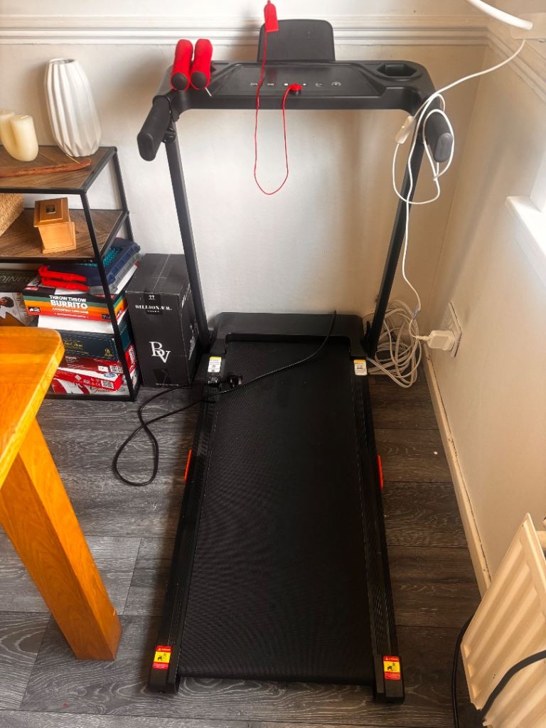 Black Treadmill with Red Hand Grips - Excellent Condition