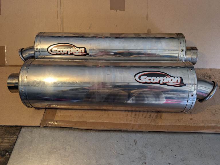 Pair of Scorpion stainless steel exhaust cans.