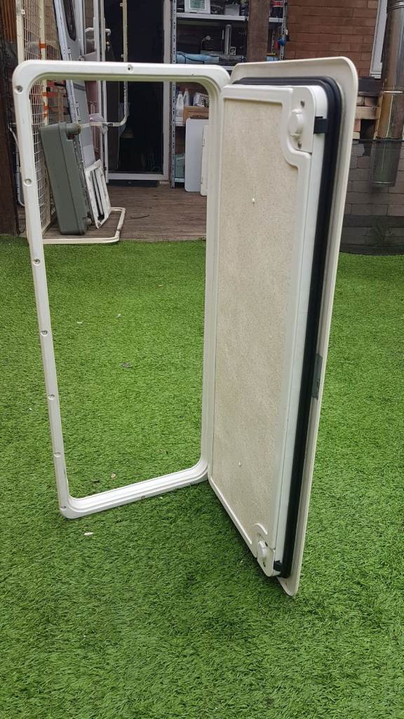 Various side doors with frames and keys for caravan camper motorhome - gas, toilet, storage.