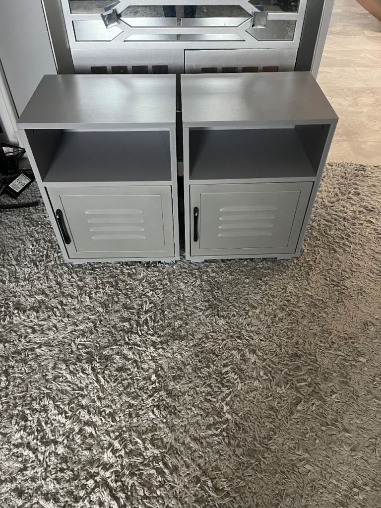 2 grey bedside tables