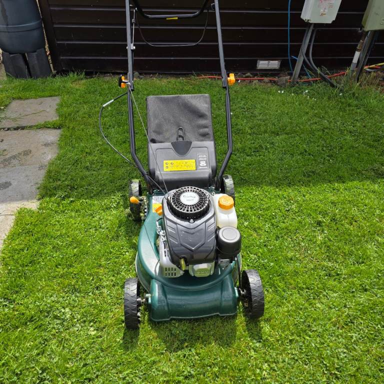 Petrol lawnmower great condition.
