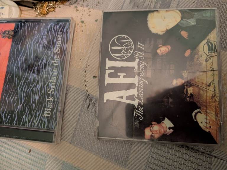 AFI CDs: The Leaving Song Pt. II and Black Sails in the Sunset