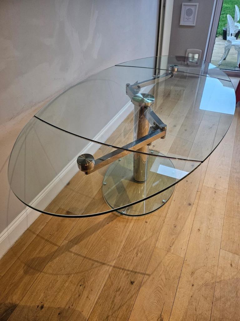 Dwell lovely glass oval dining table extending
