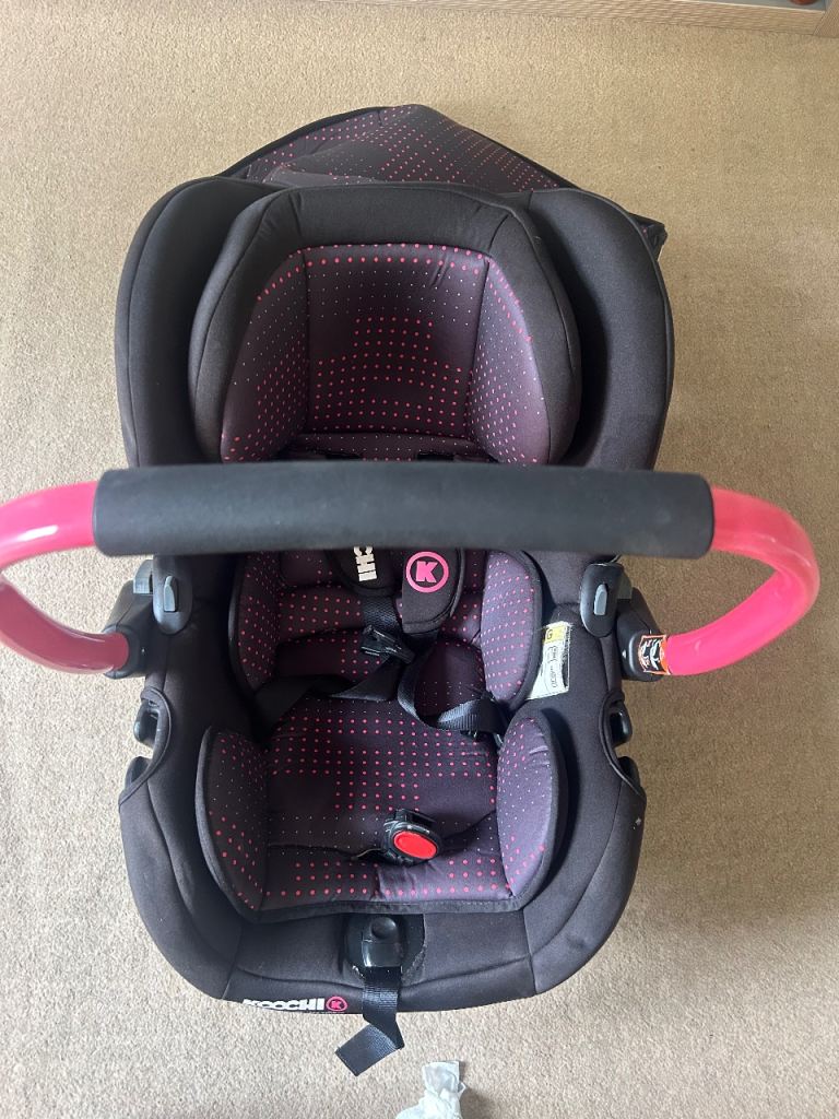 Koochi Car Seat in Good Condition – Black with Pink Polka Dots