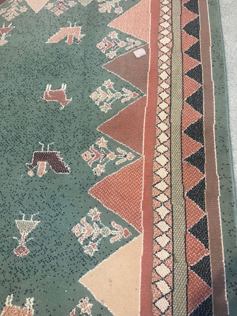 Lovely green and terracotta colours rug