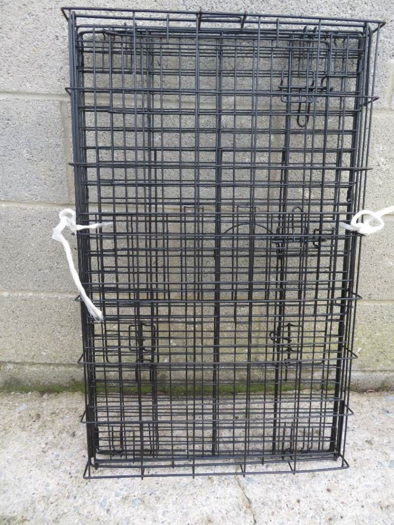 DOG CRATE IN VERY GOOD USED CONDITION.