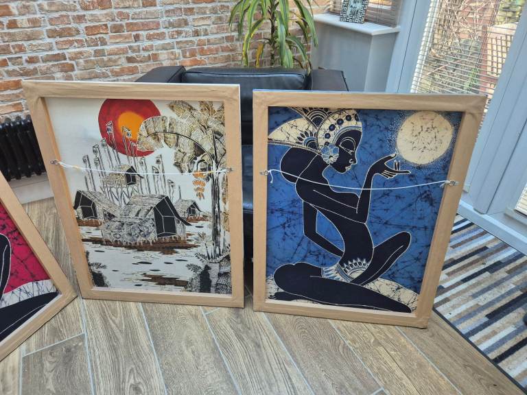 Four batik pictures on wooden frames