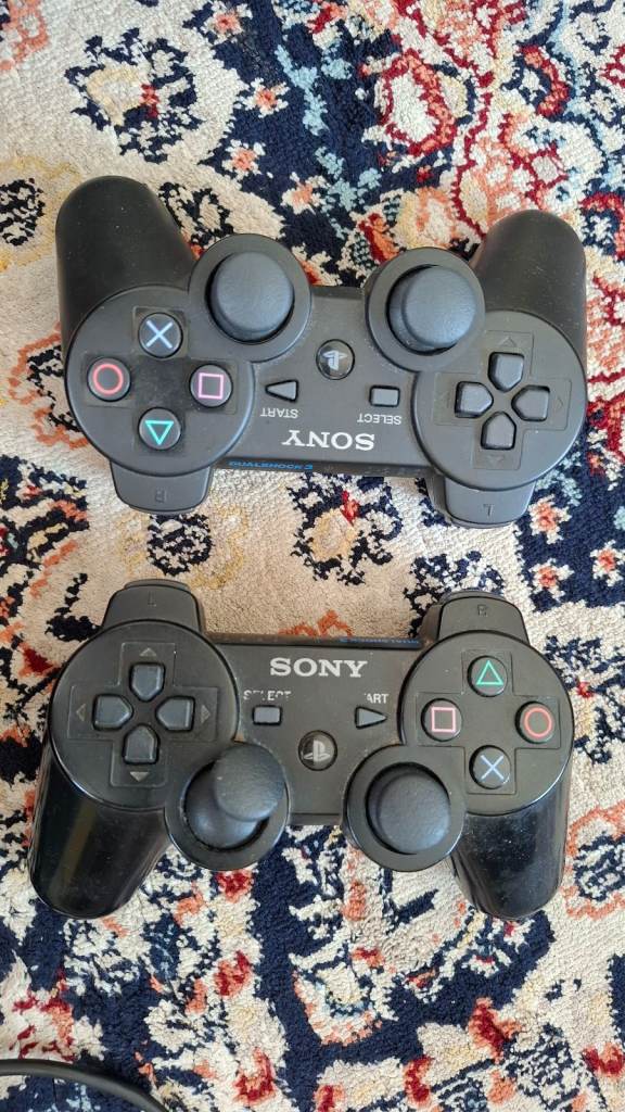 Sony PS3 with 1 extra controller and games