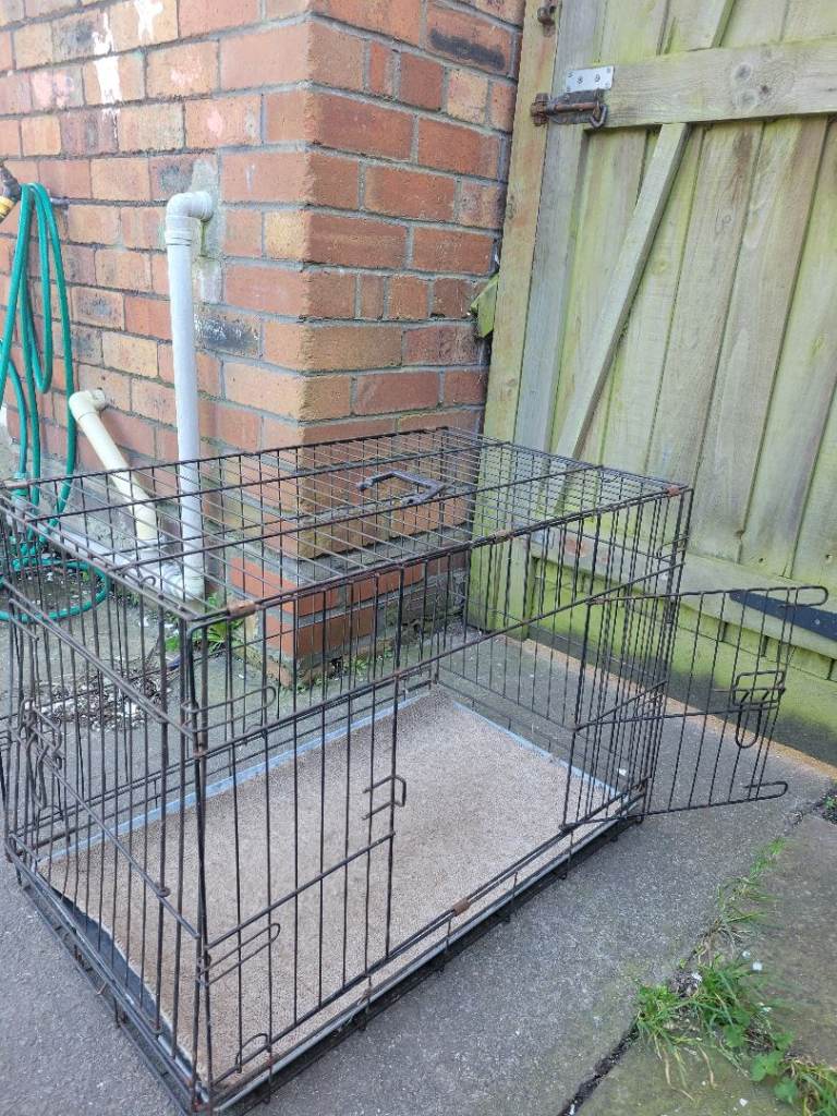 Dog cage plus dog bed - free