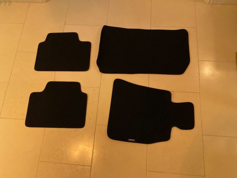 Car mats, brand new in packaging. 