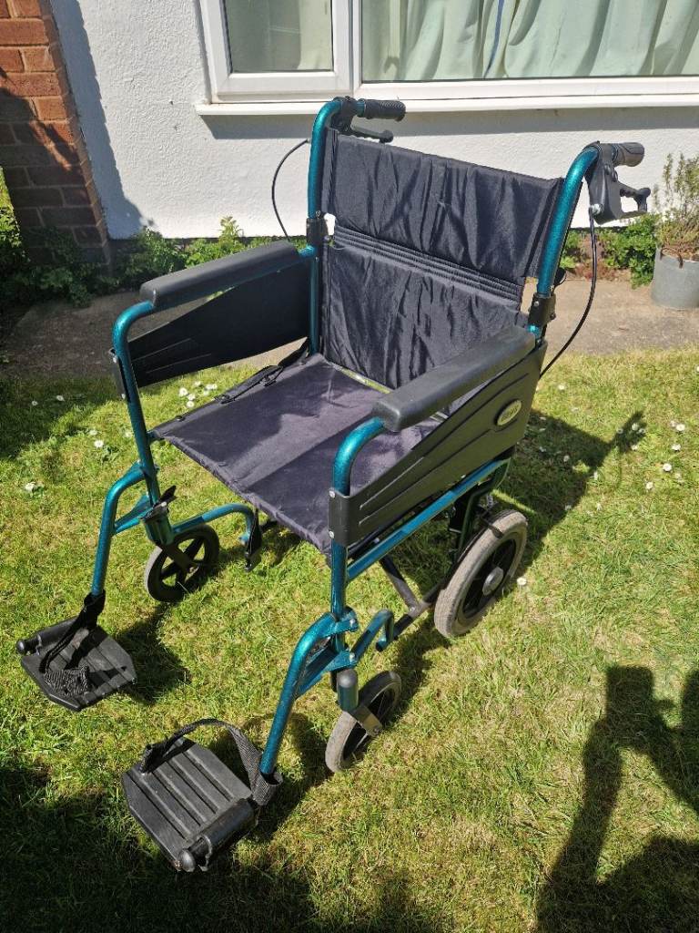 Days green wheelchair with footrests