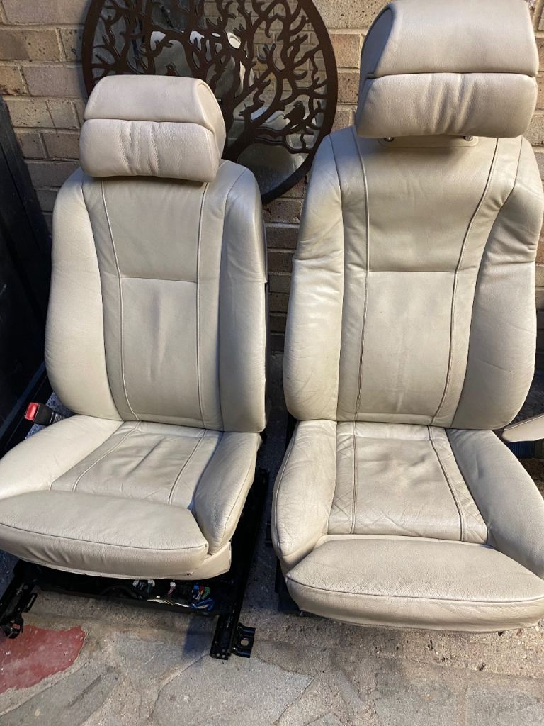 BMW 750i Front and Rear seats with plastic trims and seatbelts - 2006