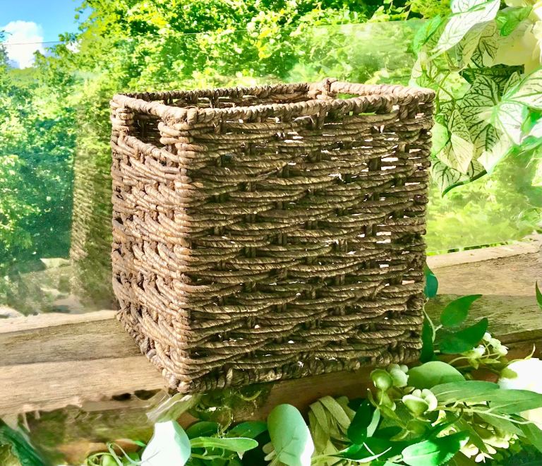Sturdy metal framed basket measures approximately 25cm wide x 17cm x 25.5cm tall