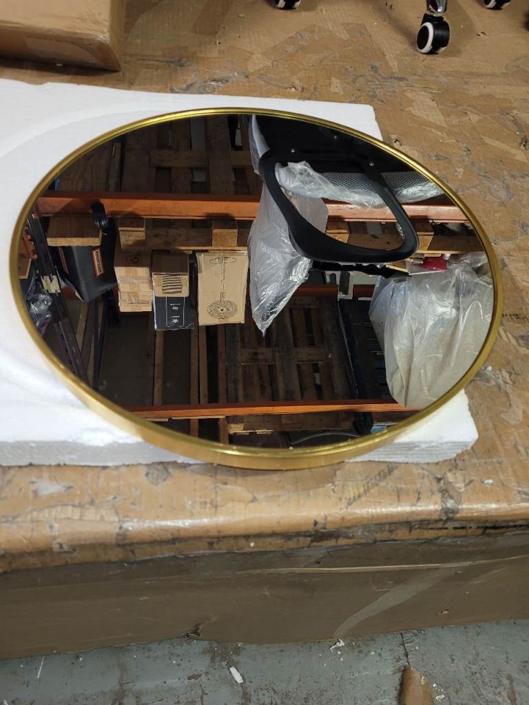 image for A new still boxed gold rimmed 50cms round wall mounted mirror.