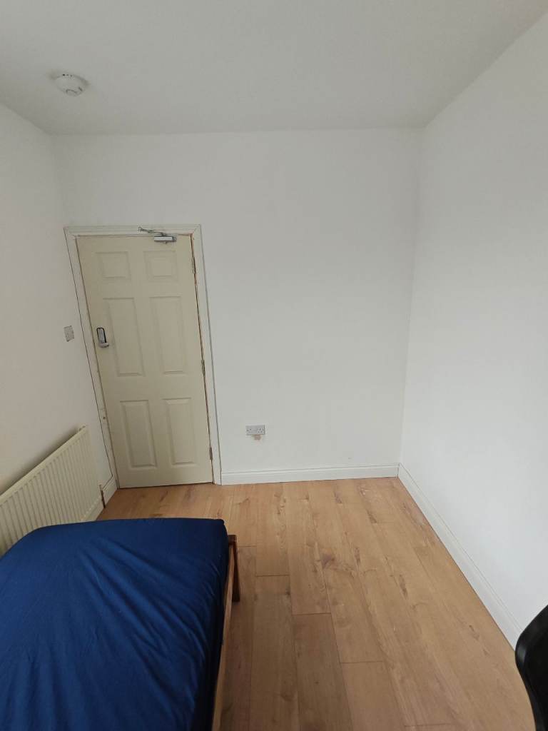 Single room shared bathroom with one other person