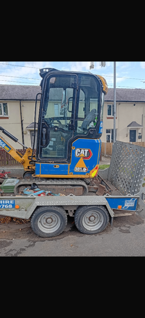 Mini digger with driver 