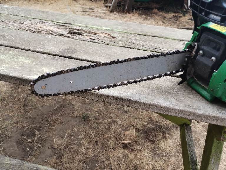 Petrol Chainsaw for Garden Work – Green, Fair Condition
